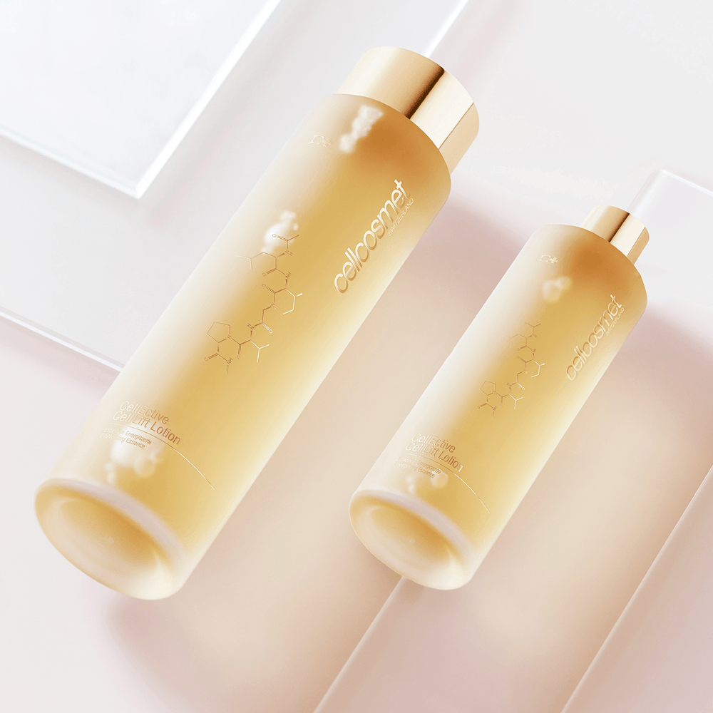 CellLift Lotion Essence in two sizes, 200 ml and 100 ml, against frosted glass pieces. 