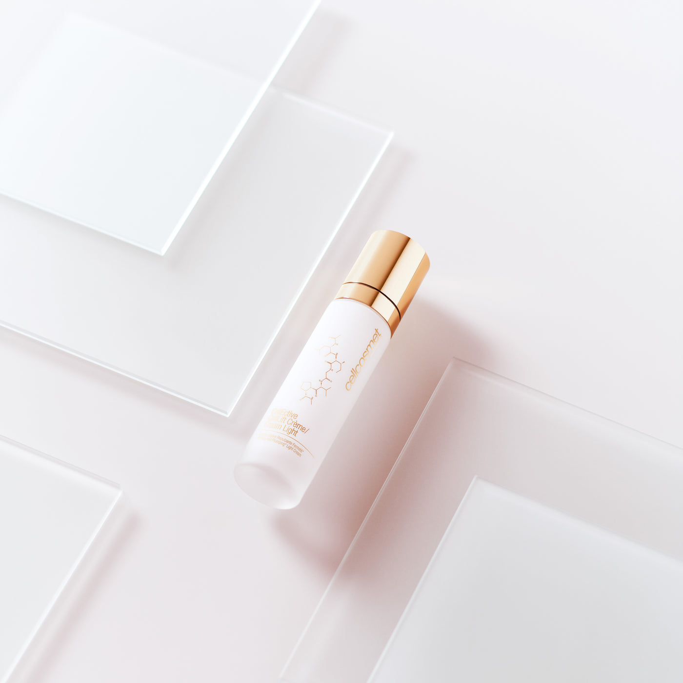 CellLift Cream with gold cap on a light white background