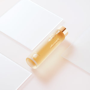 CellLift Lotion Essence bottle elegantly positioned on a glass table, highlighting its refined packaging.