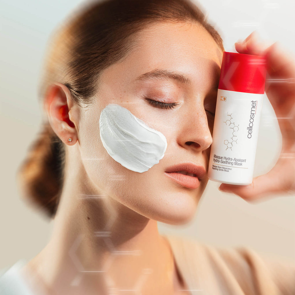 Woman applying a hydra soothing mask by Cellcosmet to face.