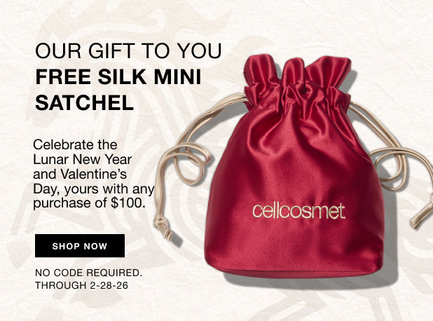 Red silk satchel with 'cellicosmet' branding on a light background