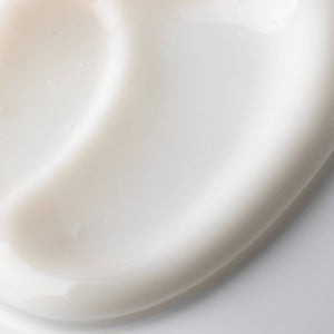 A close-up of Cellcosmet Ultra Sensitive Face Cream swatch with soft shadows and a glossy finish.