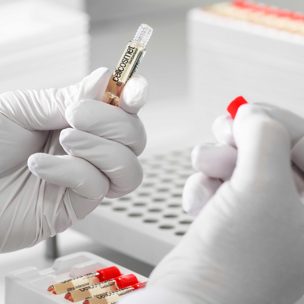 scientist holding Ultra Intensive Elasto-Collagen-XT