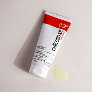 Tube of cellcosmet activator gel on a beige background