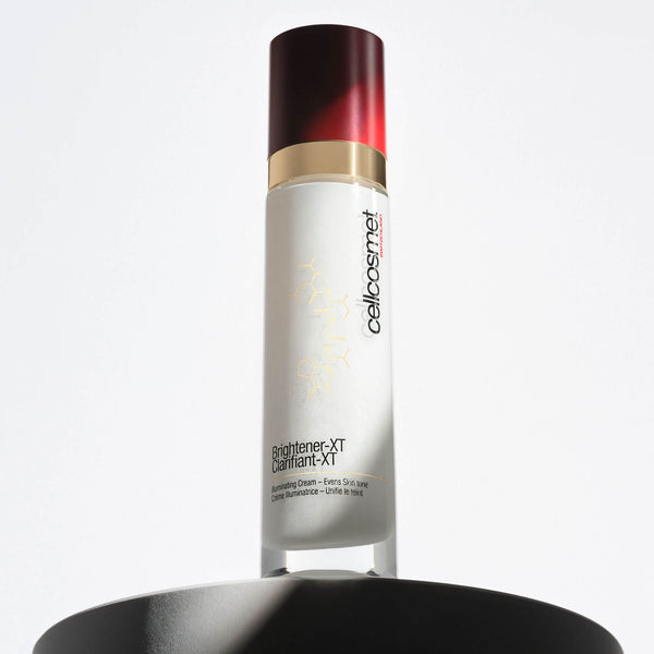 Skincare bottle labeled 'cellcosmet' on a white background