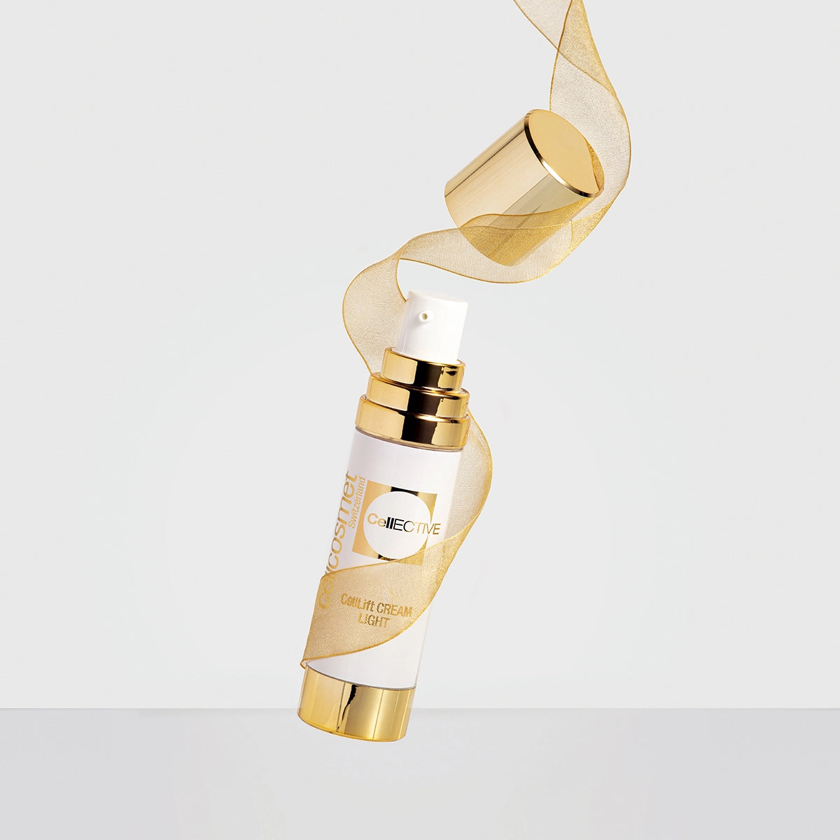 CellLift Cream Light 15ml with gold ribbon around it.