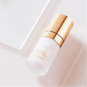 Skincare bottle of CellLift Eye Contour Cream with gold cap on a light pink background