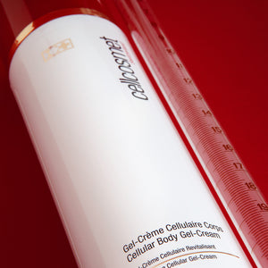 Cellular Body Gel-Cream displayed next to a measured vial against a striking red backdrop.