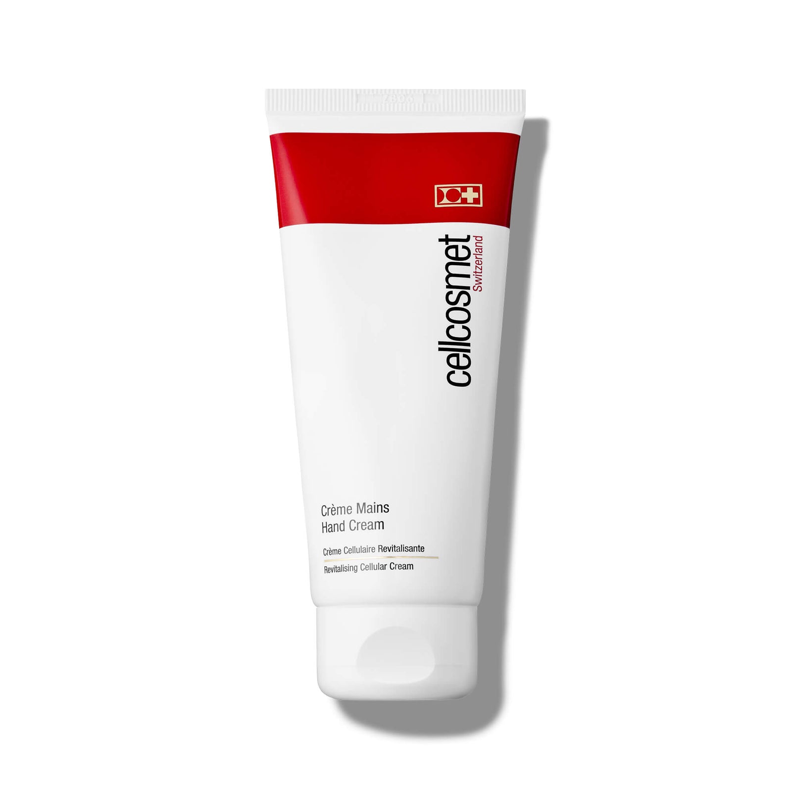 Hand cream tube with red and white design on a white background