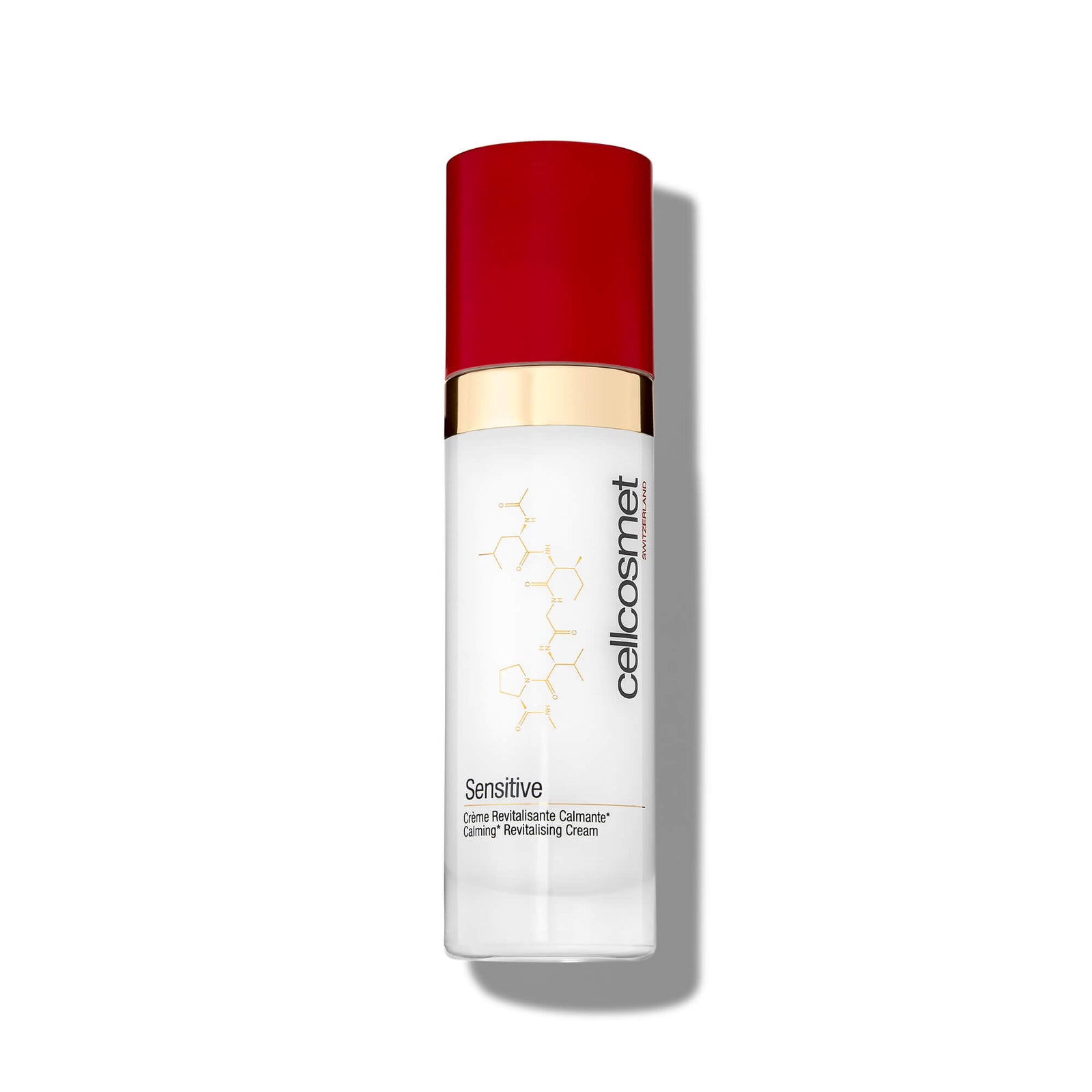 Sensitive Skincare bottle with red cap and white body on a white background