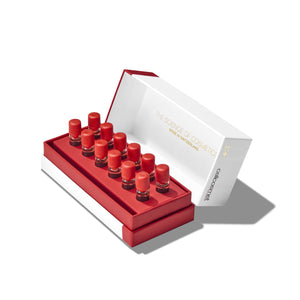 Set of ELASTO-ULTRA-INTENSIVE-XT bottles in a white and red box on a white background