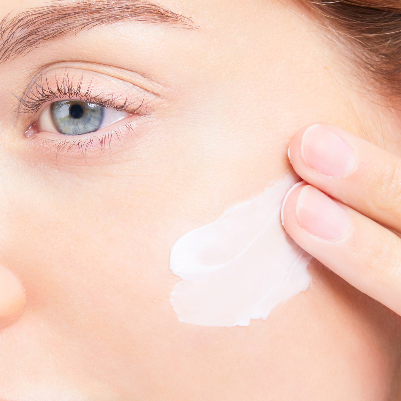 woman applying ultra vital light